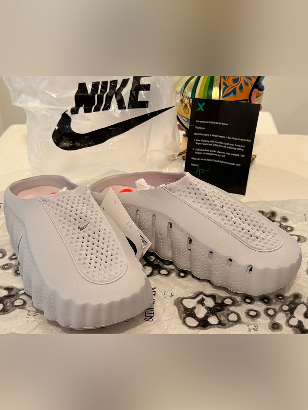 NWOB Nike MIND Slip-On Sneakers with Orange Insole Accents